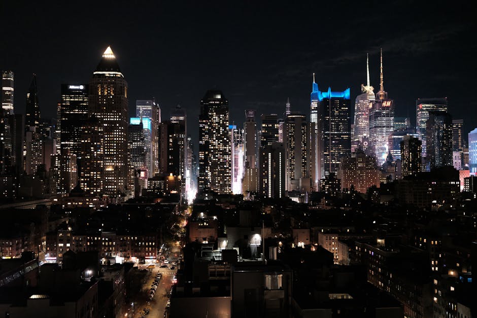 A breathtaking aerial view of New York City's illuminated skyline at night.