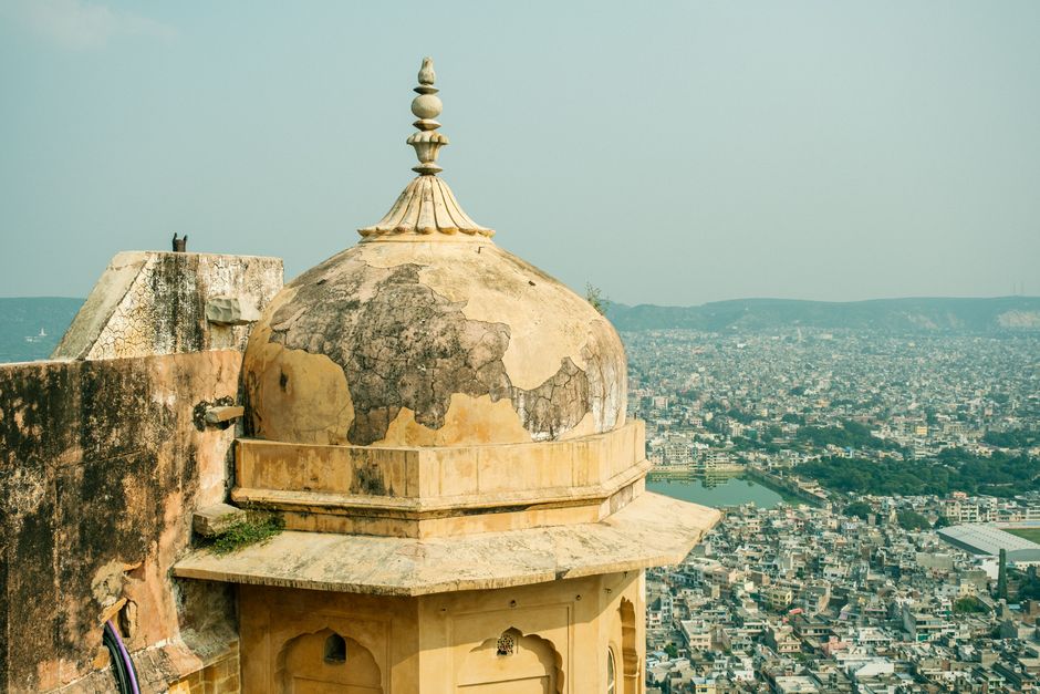A historic dome in Jaipur offering a panoramic view of the bustling cityscape.