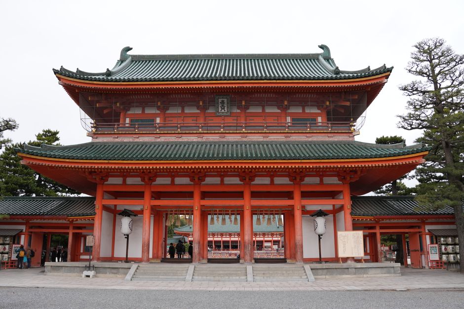 Front view of the Heian Jingu Shrine's striking orange gate in Kyoto, Japan.