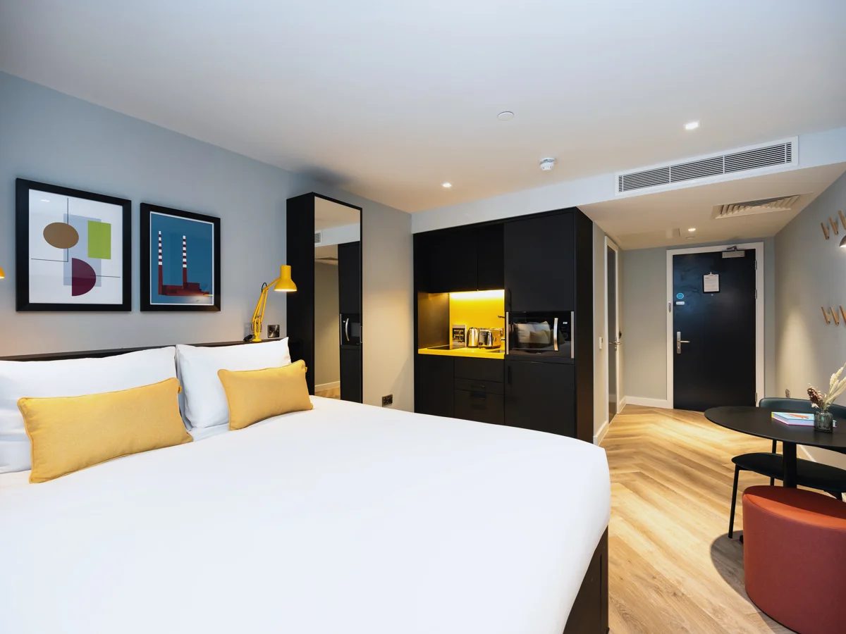 Staycity Dublin apartment bedroom and kitchenette with modern design