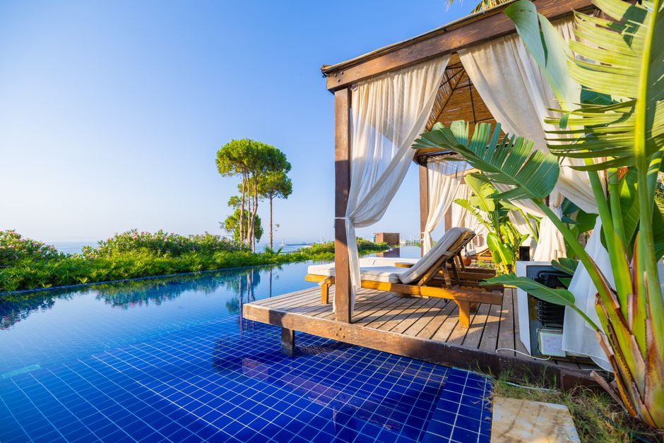 Stunning outdoor cabana by the pool with ocean views in Didim, Türkiye.